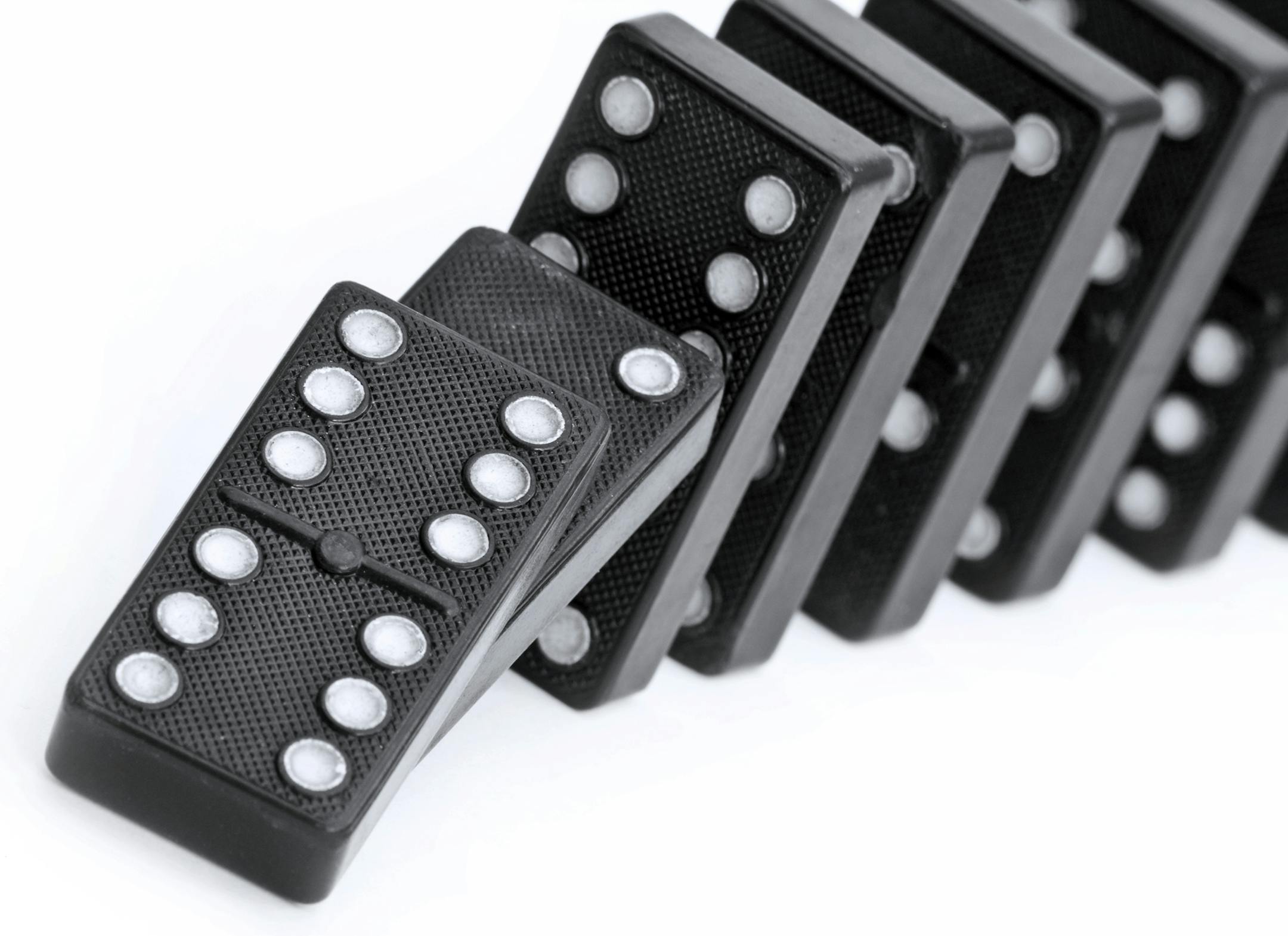 Close up of domino line falling down