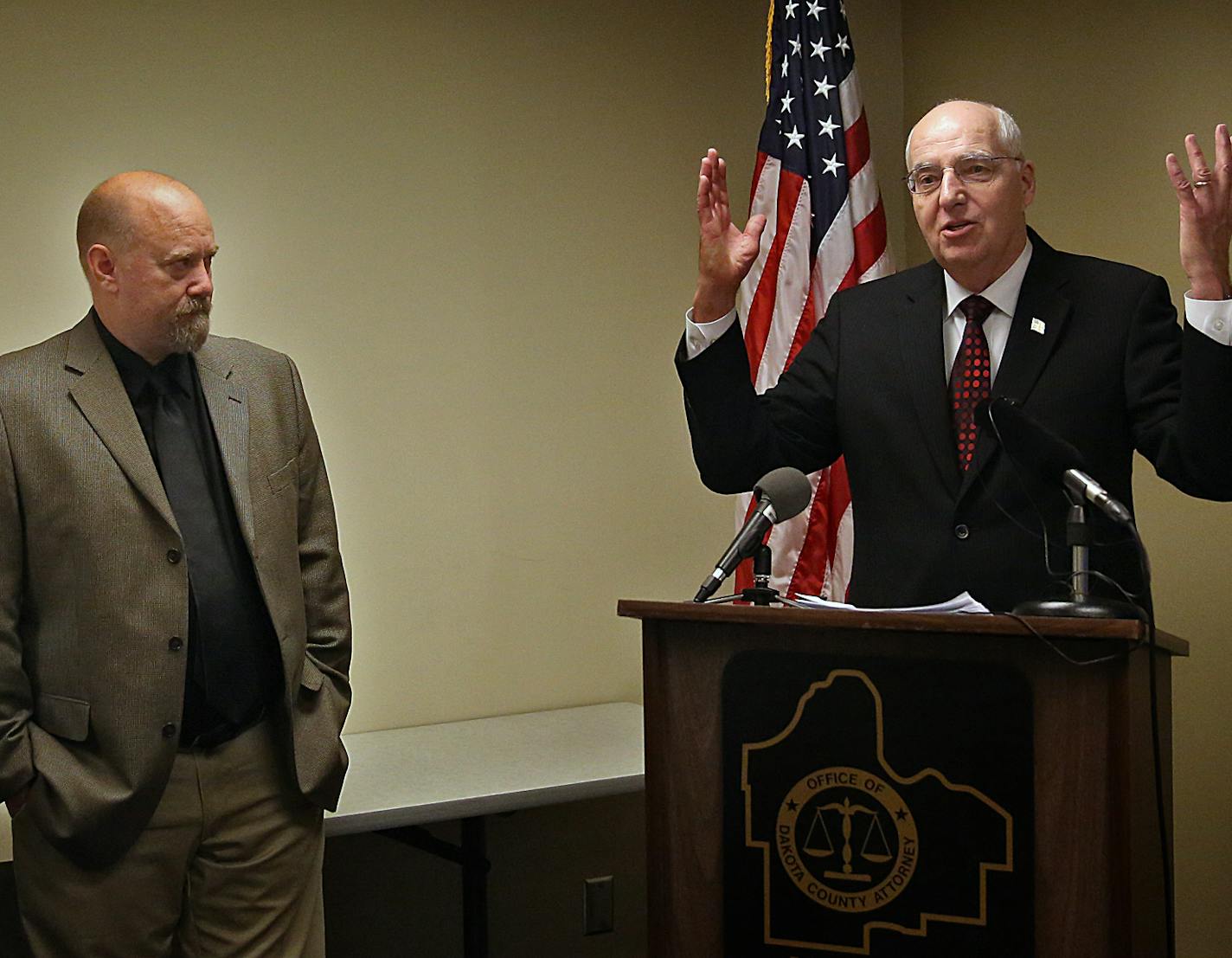 Dakota County Attorney James Backstrom (right) held a press conference Tuesday to talk about criminal charges related to Operation Guardian Angel, an undercover anti-sex trafficking effort. Dakota County says they've charged 6 people; Washington County previously charged 13. Minneapolis Police led the operation. At left are Hastings Police Chief Bryan Schafer (left) and Minneapolis Police Department Juvenile Trafficking Investigator Sgt. Grant Snyder. ] JIM GEHRZ &#xef; james.gehrz@startribune.c