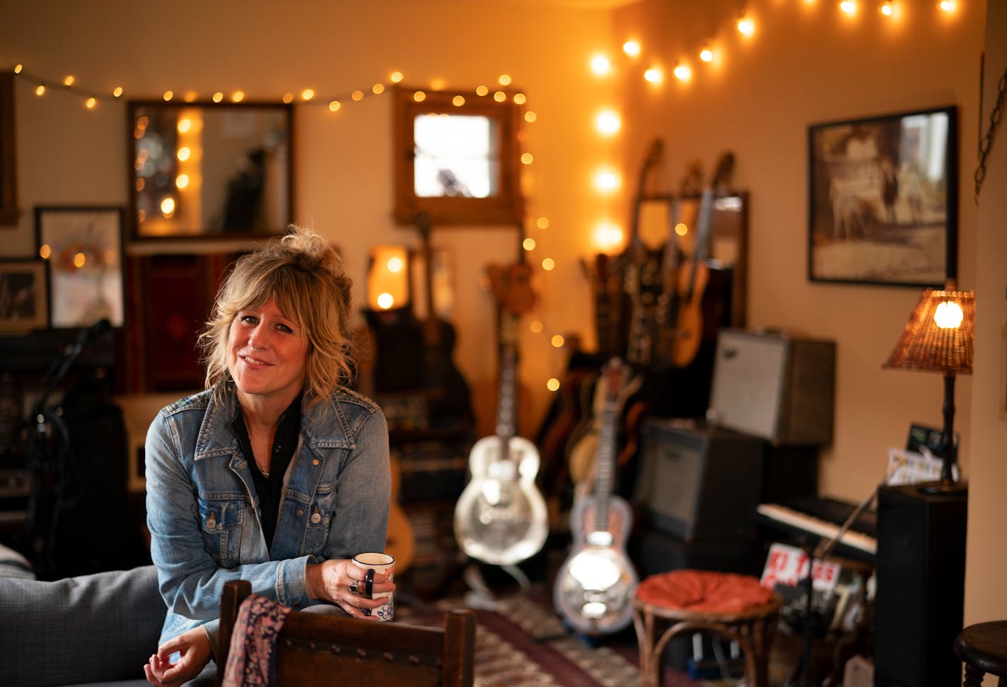 Molly Maher at home. ] JEFF WHEELER • Jeff.Wheeler@startribune.com Americana ace Molly Maher is releasing "Follow" her first album in nine years this Friday. Molly Maher was photographed at home, Sunday, afternoon March 29, 2020 in St. Paul.