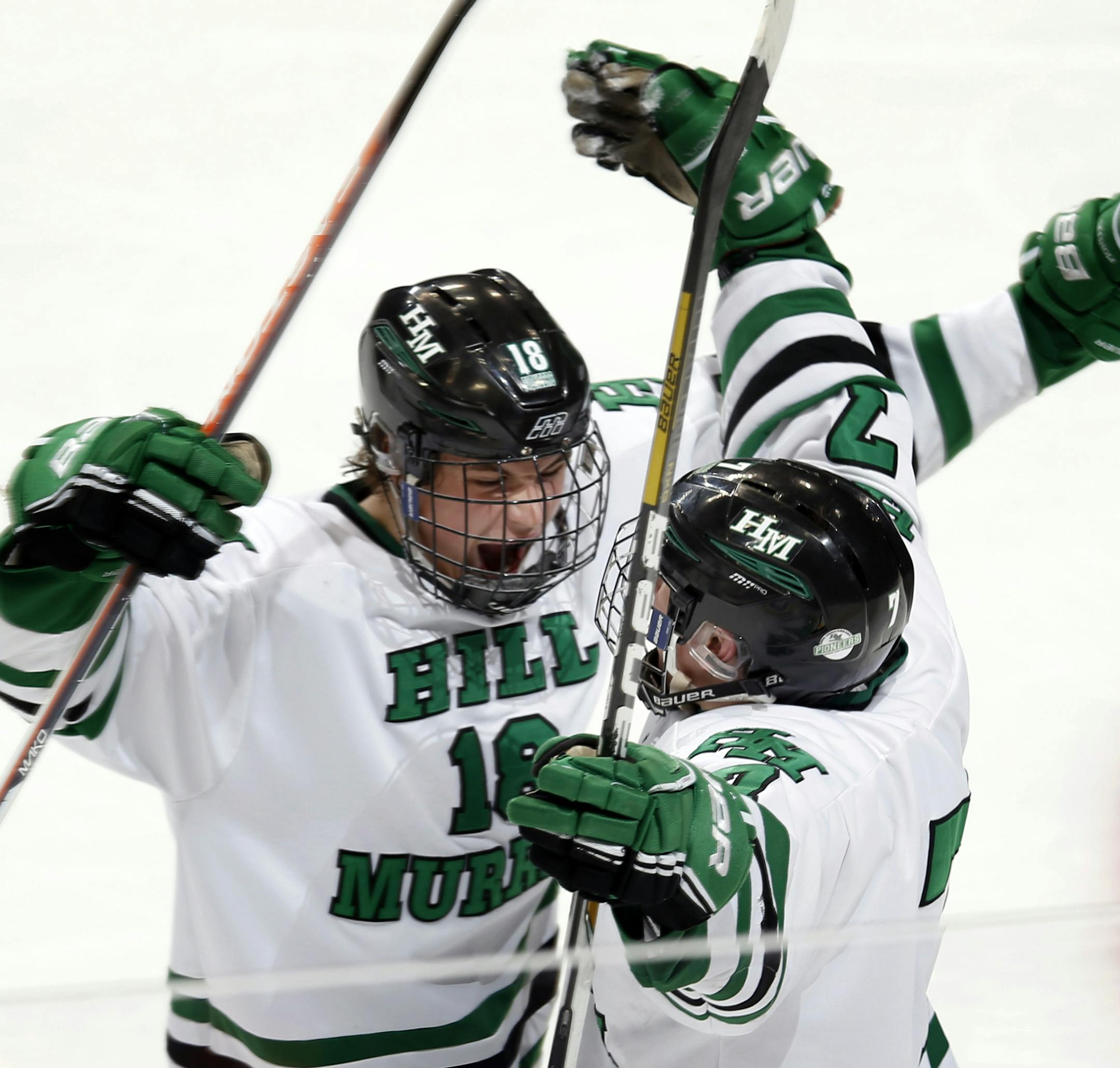 Jacob Olson (18) and Davis Zarembinski (7) celebrated a goal by Zarembinski in the third period. Hill Murray beat Wayzata by a final score of 2-1. ] CARLOS GONZALEZ cgonzalez@startribune.com - March 8, 2013, St. Paul, Minn., Xcel Energy Center, Minnesota High School Boys State Hockey, 2A Semi Finals, Hill Murray vs. Wayzata
