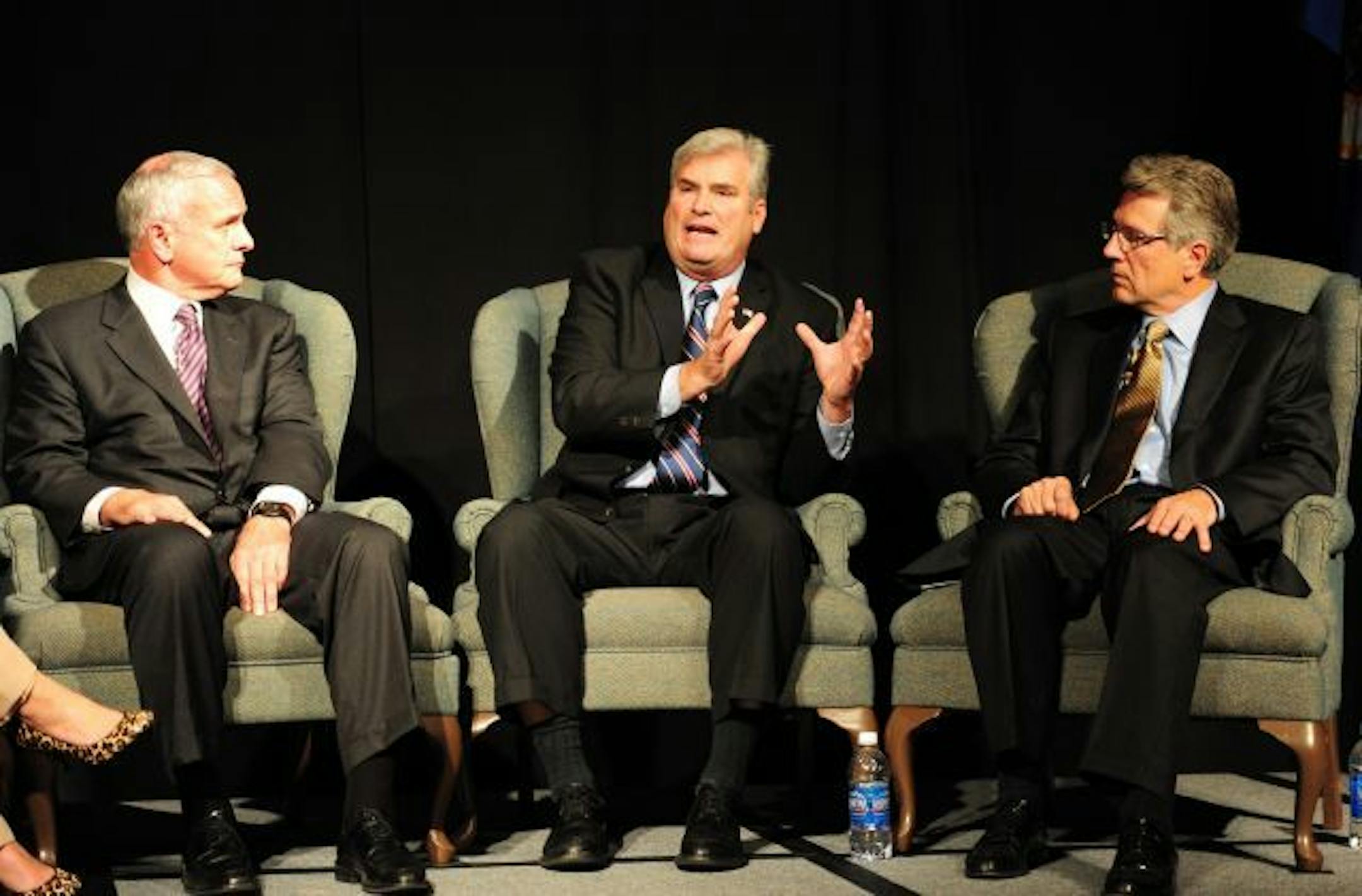 Minnesota gubernatorial candidates Mark Dayton, left, Tom Emmer, and Tom Horner debate.