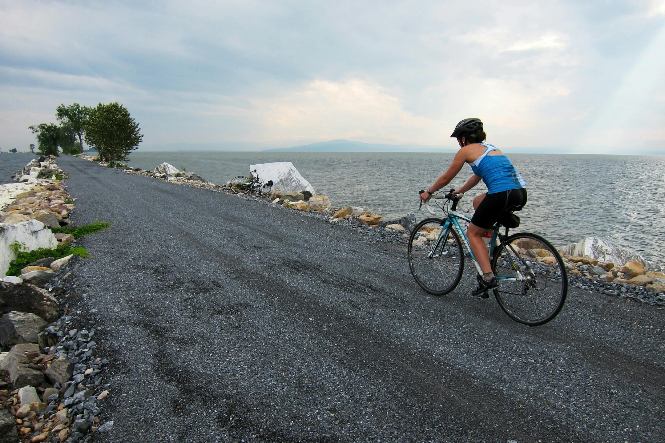 In Vermont, the Colchester Causeway extends across Lake Champlain to connect Colchester and Burlington to the nearby Lake Champlain Islands. Illustrates VERMONT-BIKE (category t), by Lindsay J. Westley, special to The Washington Post. Moved Tuesday, July 23, 2013. (MUST CREDIT: Photo for The Washington Post by Lindsay J. Westley)