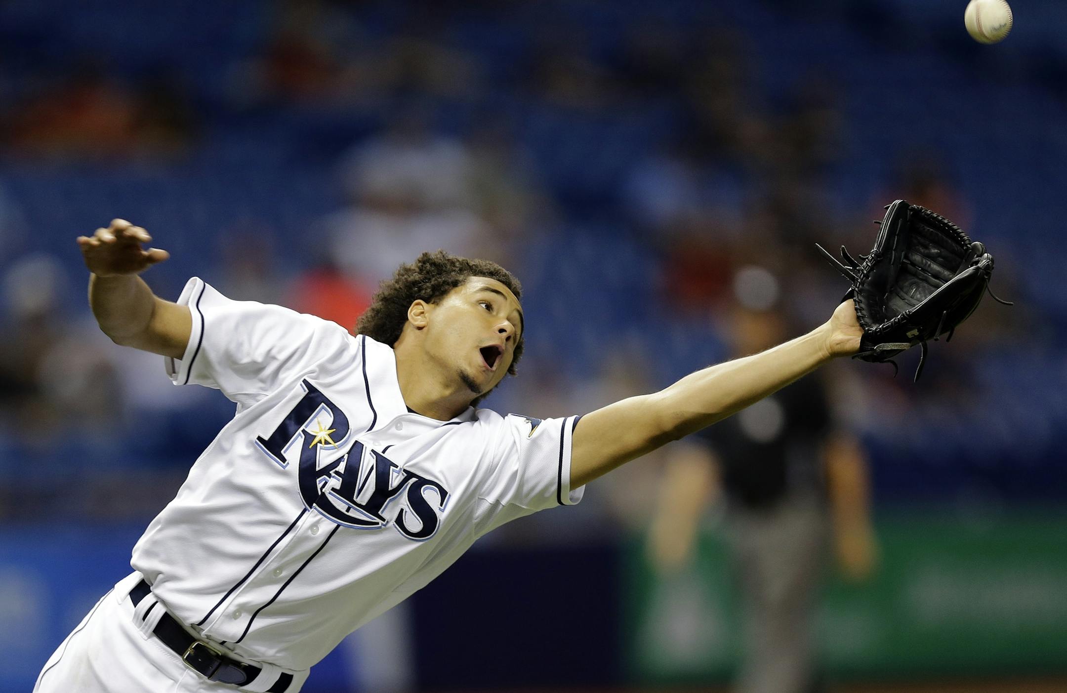 Tampa Bay Rays starting pitcher Chris Archer can't reach a bunt single by Minnesota Twins' Brian Dozier during the seventh inning of a baseball game Wednesday, Aug. 26, 2015, in St. Petersburg, Fla. (AP Photo/Chris O'Meara)