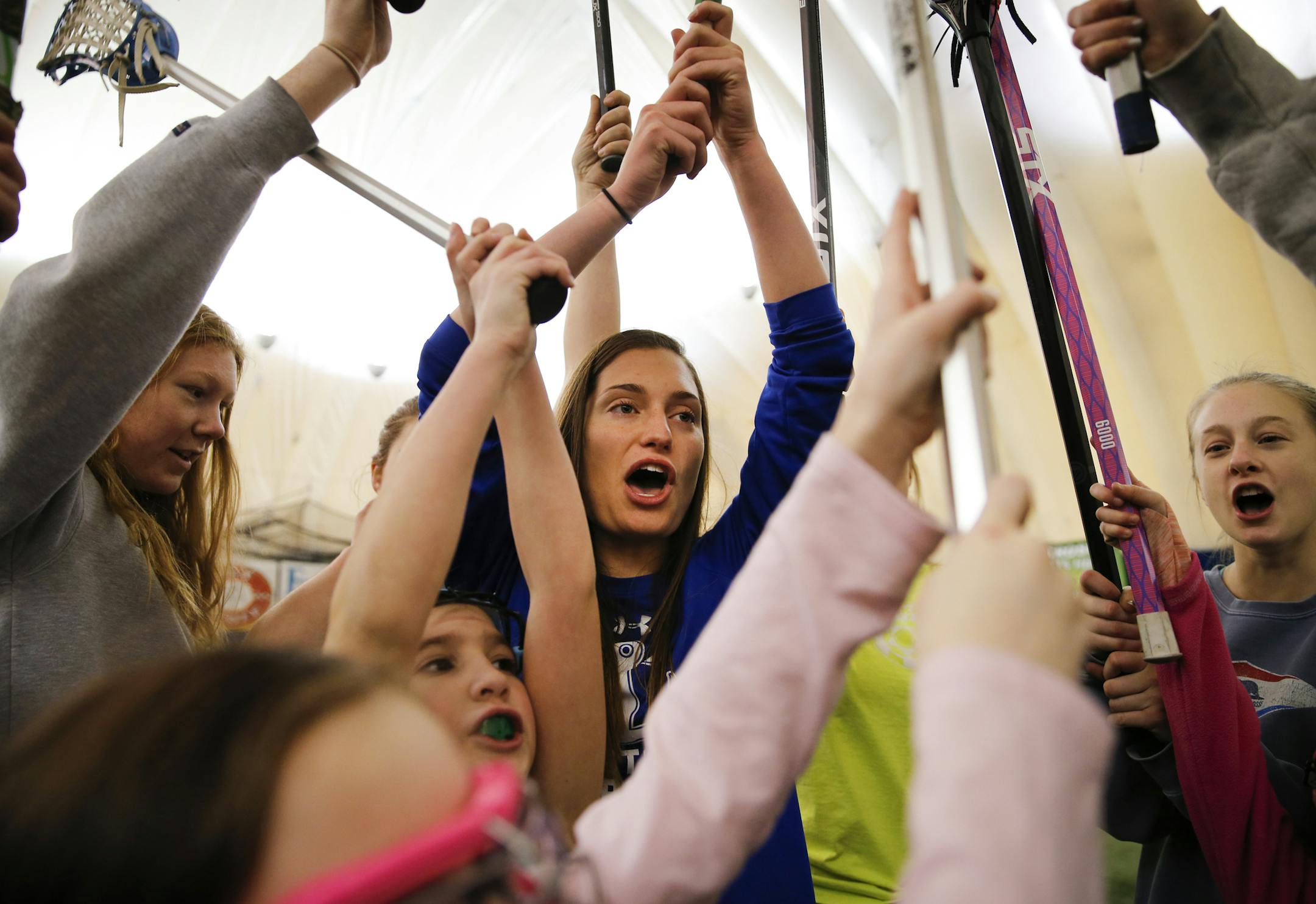 Minnetonka High School senior Lily Hohag volunteered to help teach young girls to play Lacrosse on a Saturday morning in February. ] Shari L. Gross • shari.gross@startribune.com Students at Minnetonka High can letter in volunteering, in addition to athletics and academics. Senior Lily Hohag volunteers to teach little girls lacrosse skills every Saturday morning for six weeks. She has lettered in volunteering all four years doing a variety of activities.