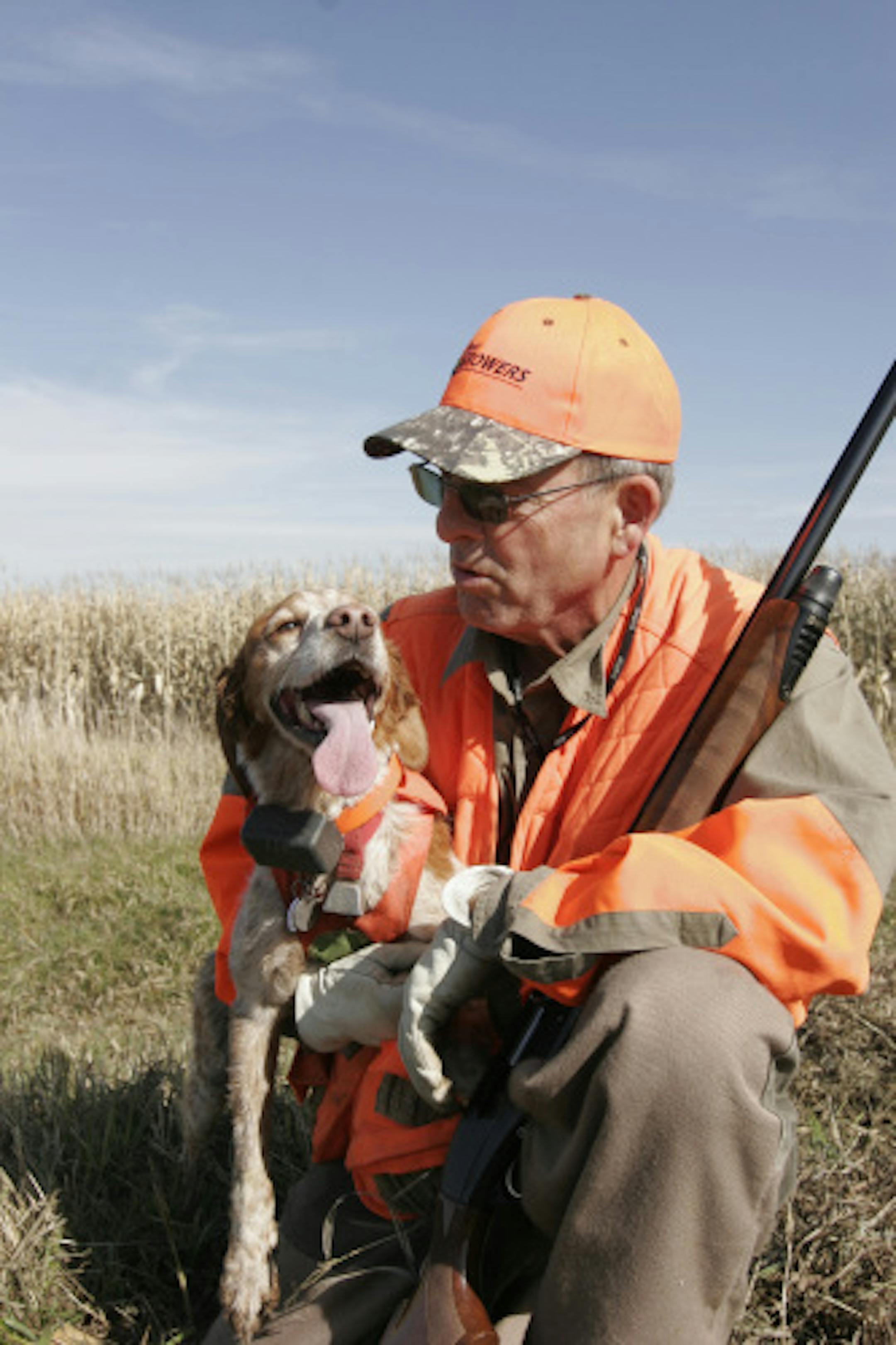 Mike Smith of Cologne, Minn., and his French Brittany Spaniel, Sophie.