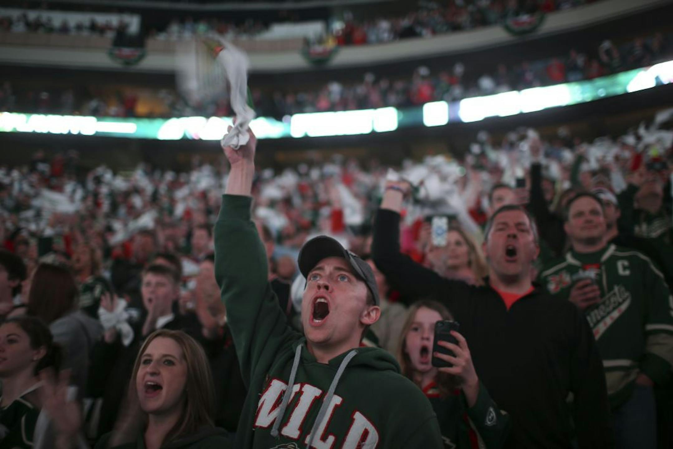 The Minnesota Wild skated against the Chicago Black Hawks in game three of their first round playoff series Sunday afternoon, May 25, 2013 at Xcel Energy Center in St. Paul. Justin and Shelly Daniels of Fargo, North Dakota cheered as the Wild stepped onto the ice at game time Sunday afternoon.