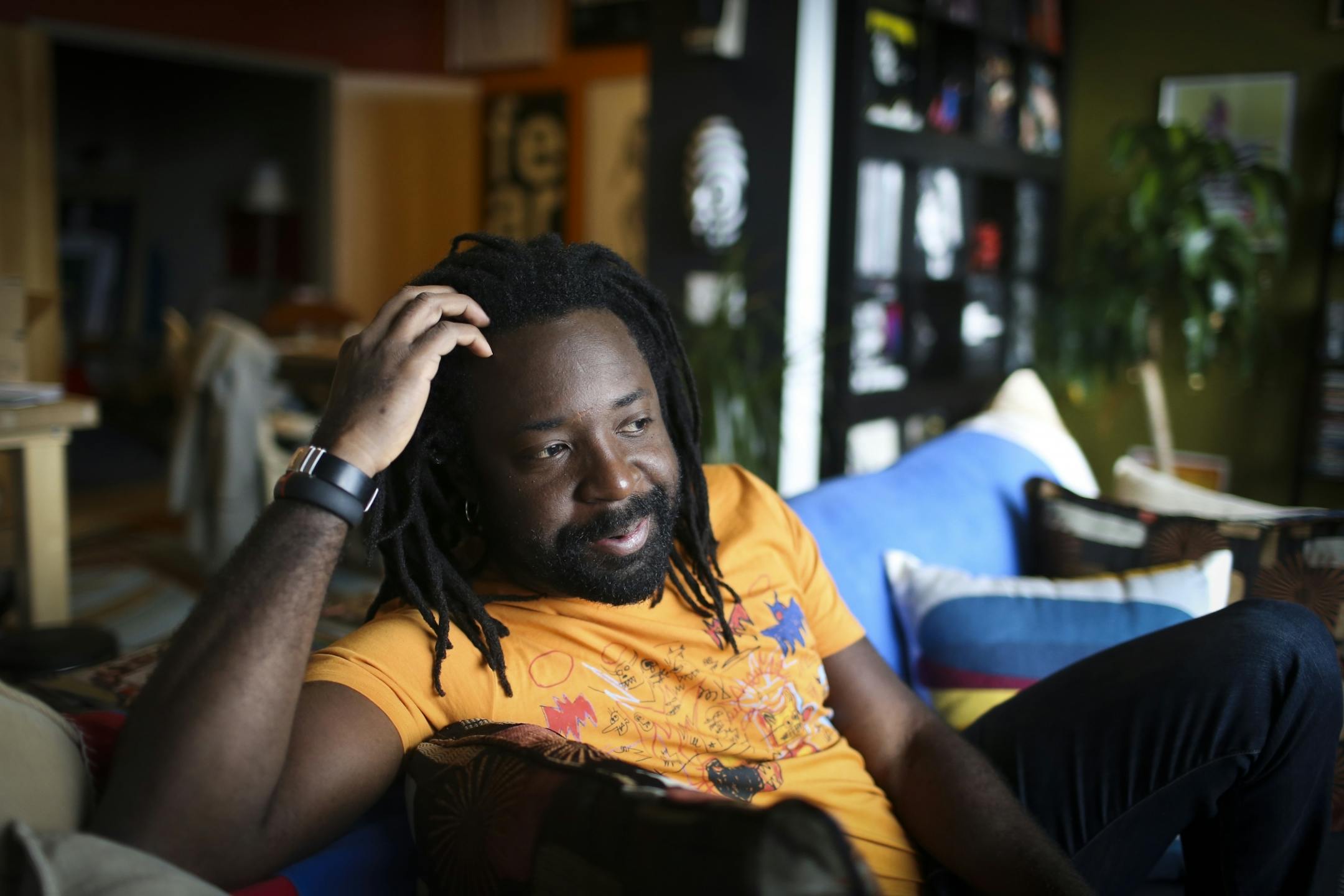 Author Marlon James photographed in his studio apartment on Friday, October 3, 2014 in Minneapolis, Minn.