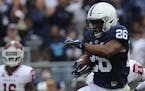 17 September 2016: Penn State RB Saquon Barkley (26) jumps leaps during a 55-yard touchdown during the fourth quarter. The Penn State Nittany Lions de