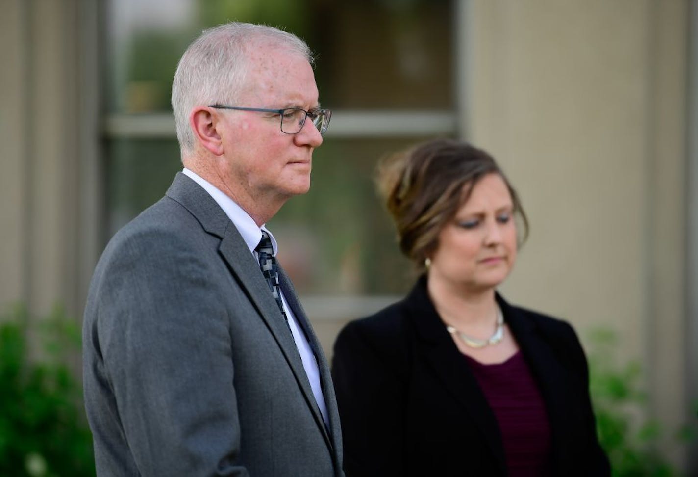 Tim O'Malley, director of the Office of Ministerial Standards and Safe Environment, stood beside Janell Rasmussen, deputy director of the Office of Ministerial Standards, as they listened to Archbishop Bernard Hebda as he spoke to the media about the settlement reached between abuse survivors and the Archdiocese of St. Paul and Minneapolis.