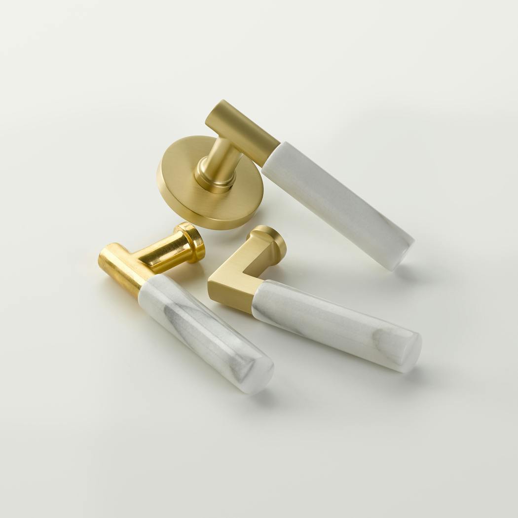 Emtek hardware is always pushing the design perimeter and this year was no different with its Select Marble Lever.