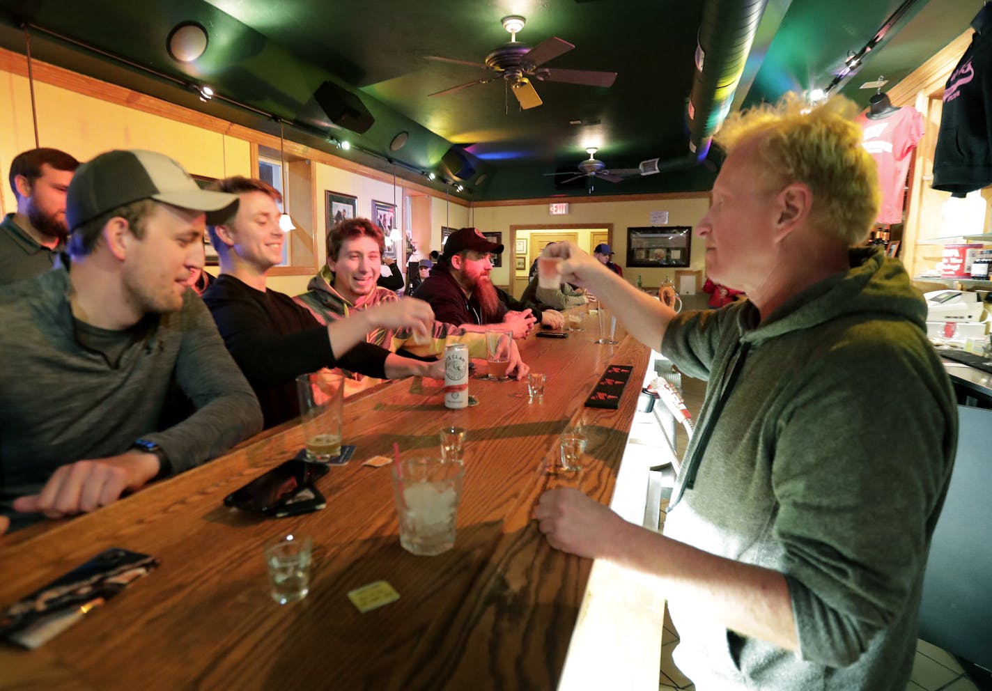 Owner Michael Mattson toasted the opening of Appleton's Friends and Neighbors bar on Wednesday.