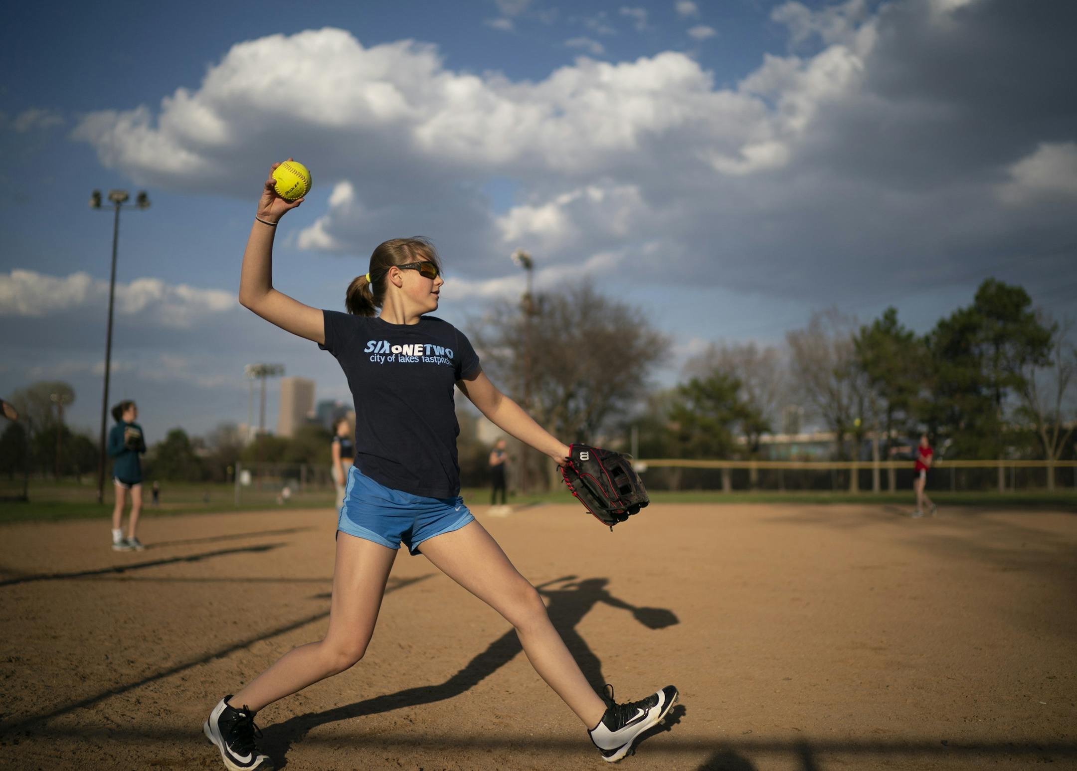 Emma Tomasko played catch with a teammate while warming up before 612 U12 practice Thursday evening. ] JEFF WHEELER • jeff.wheeler@startribune.com Like most of their suburban counterparts, Minneapolis softball players now have a club team that they can play with in addition to their high school team. Club 612's U12 team practiced at a Bryn Mawr field Thursday evening, April 25, 2019 in Minneapolis.
