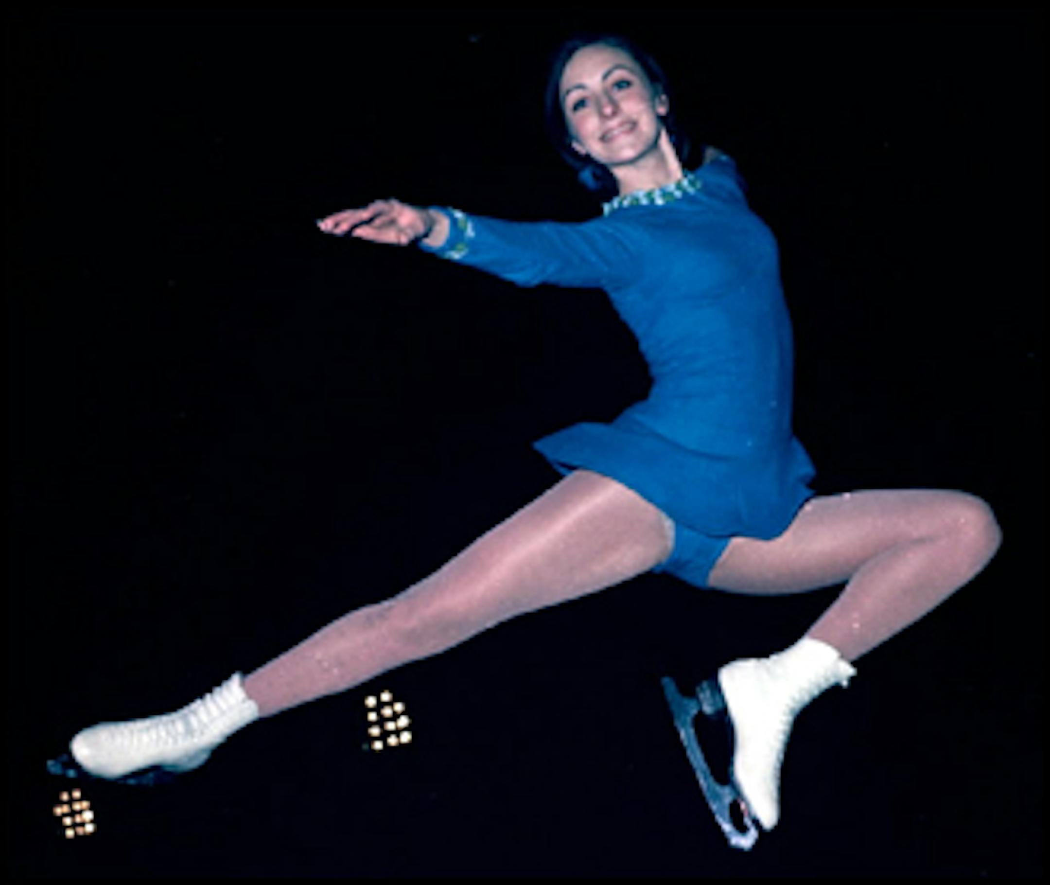 Peggy Fleming is shown in a high leap at the Olympic ice rink in Grenoble in preparation for her bid for a gold medal in the women's freestyle figure skating, February 9, 1968. (AP Photo)