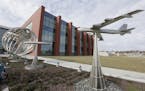 A statue of a B-52 bomber stands in front of C2F, US Strategic Command's new command and control facility at Offutt AFB in Neb, is seen following a de