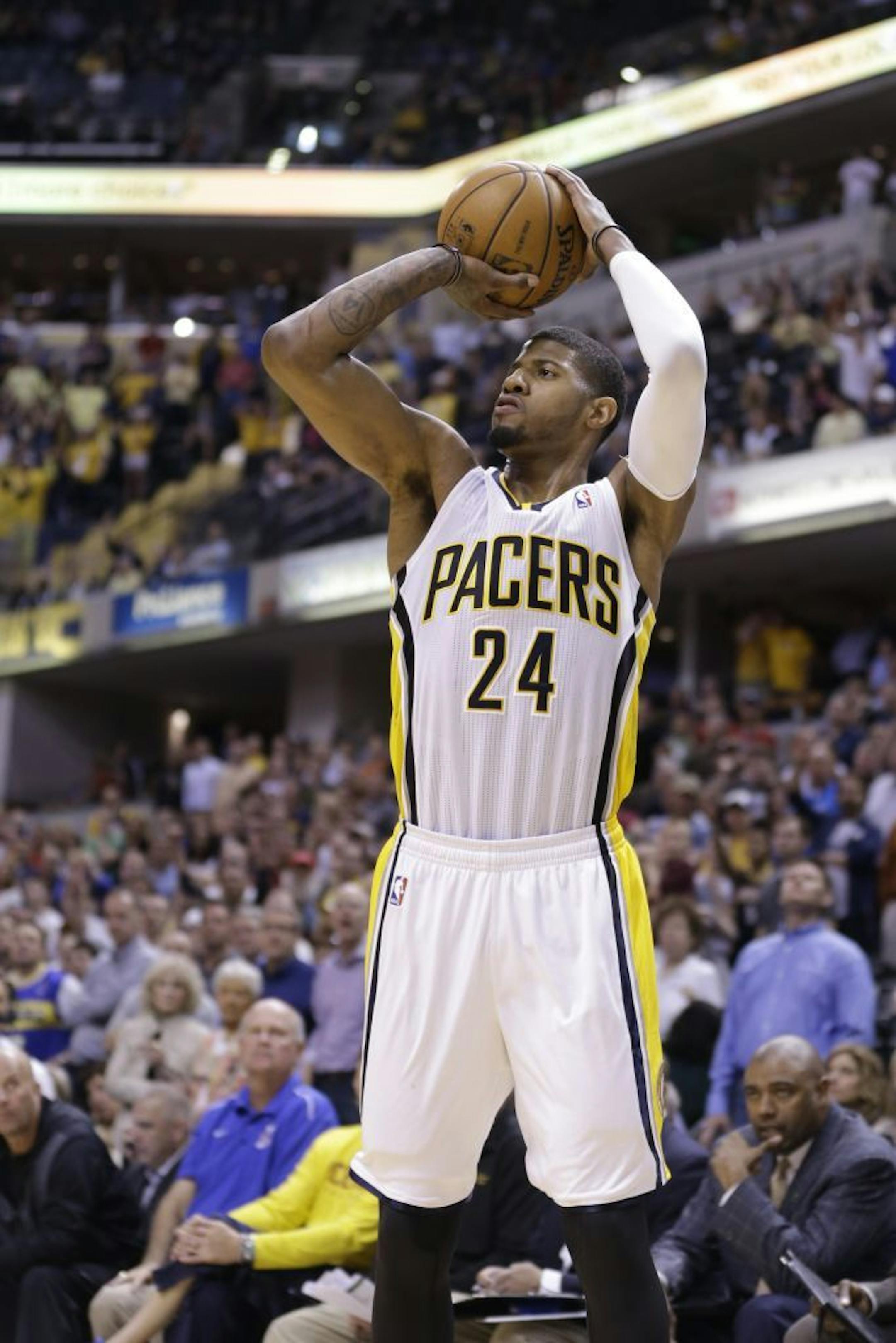 Indiana Pacers forward Paul George shoots against the Cleveland Cavaliers in the second half of an NBA basketball game in Indianapolis, Tuesday, April 9, 2013. The Pacers defeated the Cavaliers 99-94.
