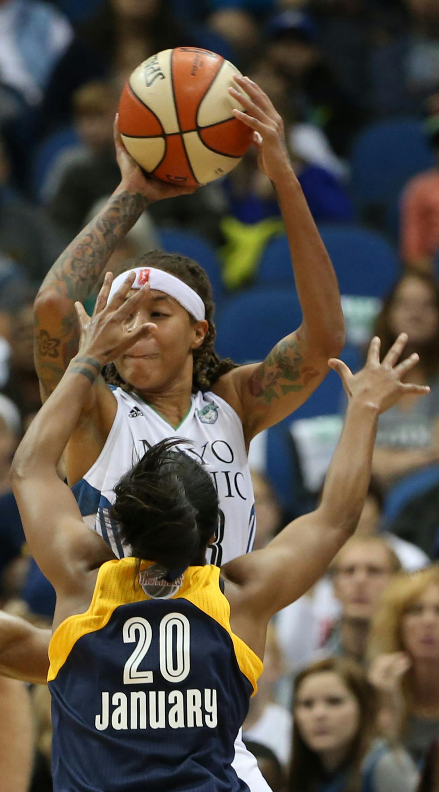 Lynx Seimone Augustus tried to pass over Indiana's double team during the second half. ] (KYNDELL HARKNESS/STAR TRIBUNE) kyndell.harkness@startribune.com Game 1 of the WNBA Finals Lynx vs Indiana at the Target Center in Minneapolis Min., Sunday October 4, 2015. Indiana wonder the Lynx 75-69.