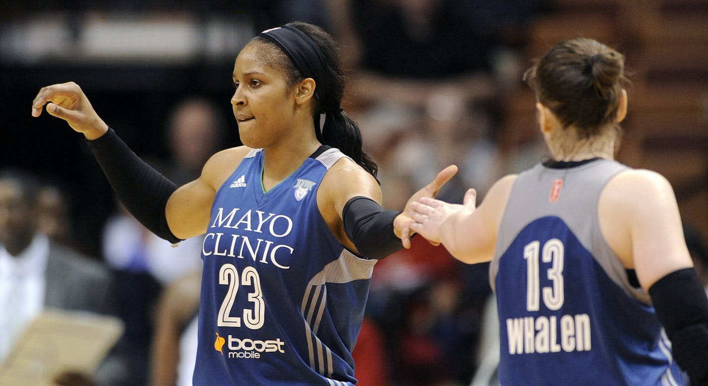 The Lynx's Maya Moore (23) and Lindsay Whalen.