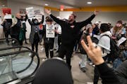 People chant “Free, Free Palestine” outside the meeting after the Minneapolis City Council, meeting as a Committee of the Whole, approved a resolu