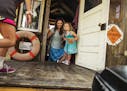 Kara Yorkhall and daughter Juliette,3, stepped unto the back deck after chatting with captain/artist Wes Modes who will traveling on the Missississipp