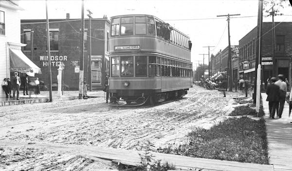 A double-decker streetcar operates in Excelsior in the early 1900s. These special cars were only run for several years.