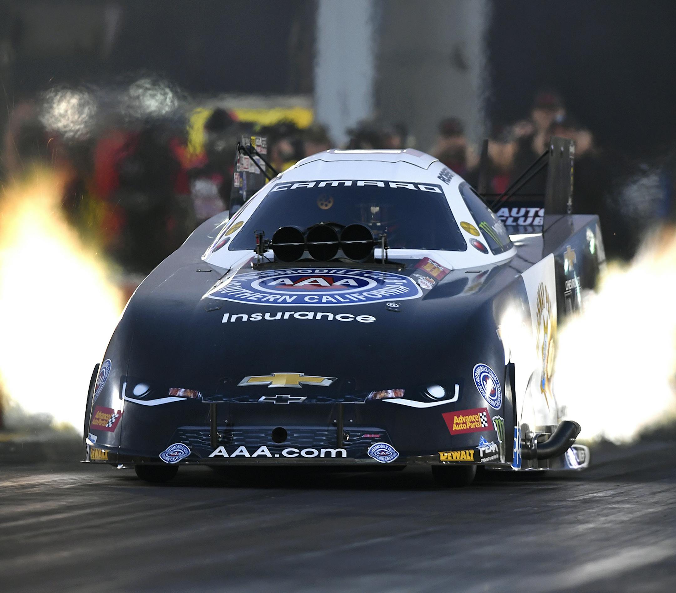 In this photo provided by the NHRA, Robert Hight drives in Funny Car qualifying Friday, July 28, 2017, for the Toyota NHRA Sonoma Nationals drag races in Sonoma, Calif. Hight topped the first day of qualifying with a run at 339.87 mph in 3.807 seconds. (Marc Gewertz/NHRA via AP