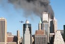 (NYT2) NEW YORK -- Sept. 11, 2001 -- TERROR-RDP-2 -- A second aircraft approaches the World Trade Center just prior to hitting the skyscraper, Monday.