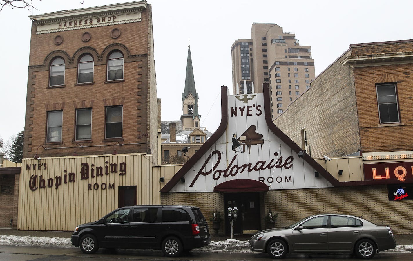 A three-story building to the left of the iconic Nye's Polonaise front door was built as a harness shop in 1907 was seen Friday, DEc. 5, 2014, in Minneapolis, MN.](DAVID JOLES/STARTRIBUNE)djoles@startribune.com The owner of Nye's Polonaise may intend to close the Minneapolis institution next year, but demolishing the buildings wil be a tough sell at City Hall. Two of the four buildings on the site are contributing to the St. Anthony Falls Historic District, which gives them major protections und