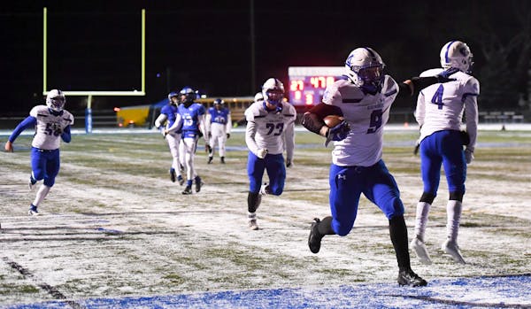 With 47.8 second left on the clock, Cambridge-Isanti running back Gaven Ziebarth (9) scored the game-winning touchdown against Tartan. ] AARON LAVINSK