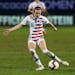 USA midfielder Rose Lavelle takes a shot on goal in the first half of the finals of the CONCACAF Women's soccer Championship on Wednesday