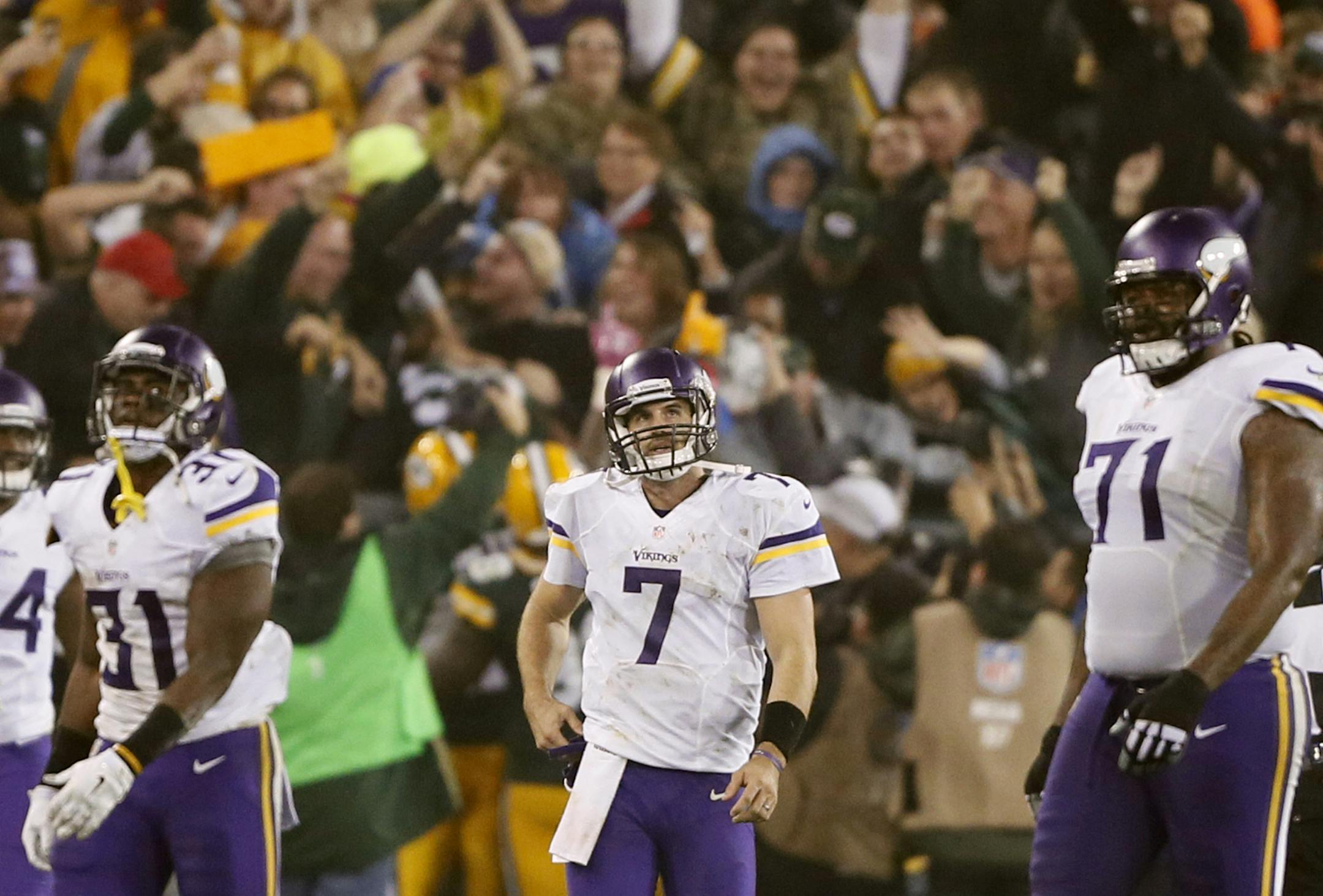 Minnesota Vikings quarterback Christian Ponder (7) walked off the field after throwing a pick six in the second quarter. The Minnesota Vikings played the Green Bay Packers Thursday October 2 , 2014 at Lambeau Field in Green Bay ,WI. ] Jerry Holt Jerry.holt@startribune.com