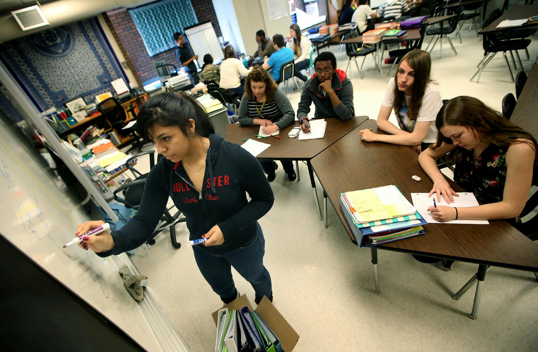 Guadalupe Genis, 15, led a group discussion based on a math question during AVID (Advancement Via Individual Determination) at Joseph Nicollet Junior High School, Tuesday, May 20, 2014 in Burnsville, MN. ] (ELIZABETH FLORES/STAR TRIBUNE) ELIZABETH FLORES &#x2022; eflores@startribune.com