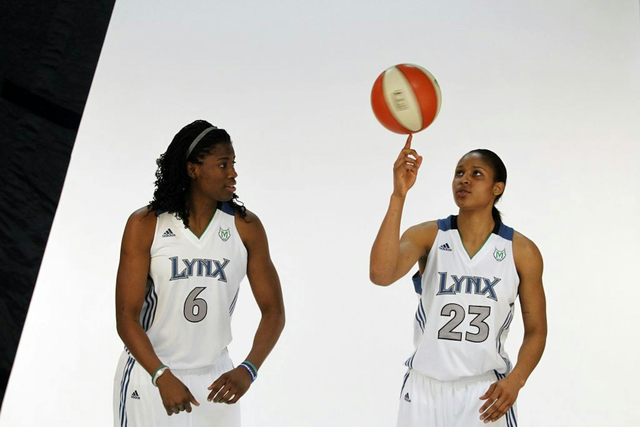 First-round picks Maya Moore, right, and Amber Harris.