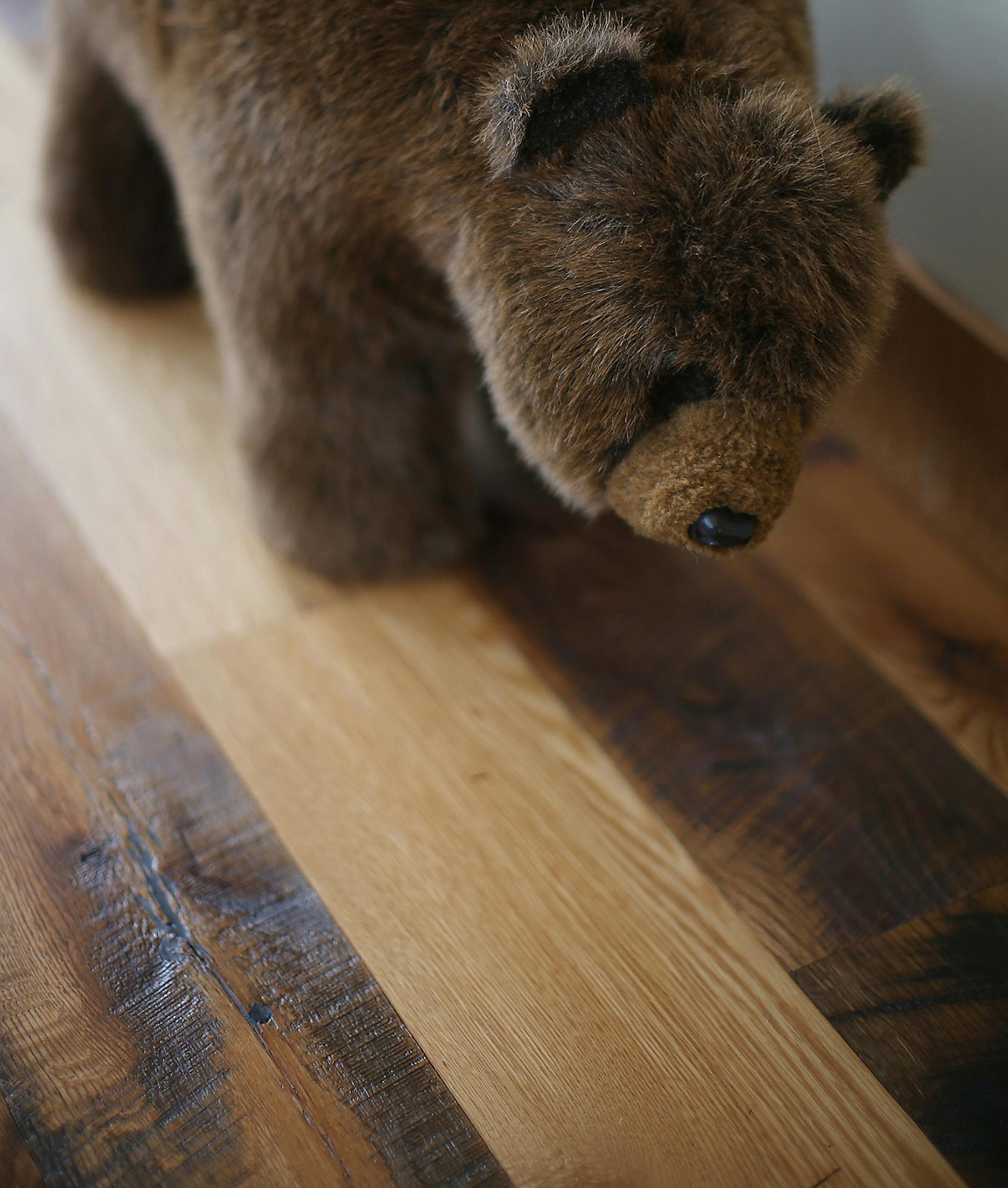 The flooring is made of reclaimed barnwood.