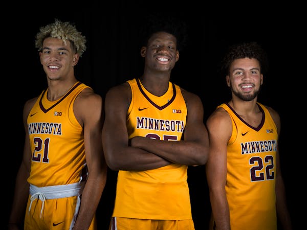 Minnesota grown sophomores, from left, Jarvis Omersa, Daniel Oturu, and Gabe Kalscheur posed for a photo last season.