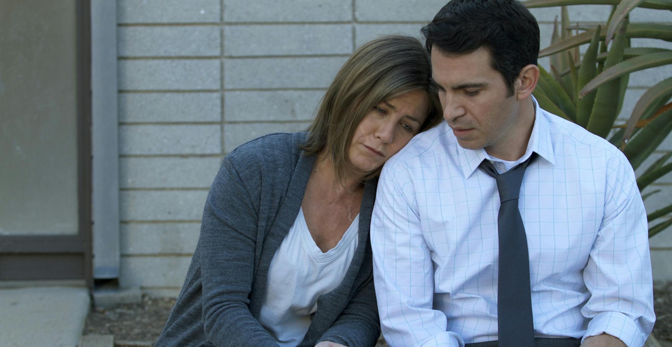 This image released by Cinelou Films shows Jennifer Aniston, left, and Chris Messina in a scene from "Cake." (AP Photo/Cinelou Films)