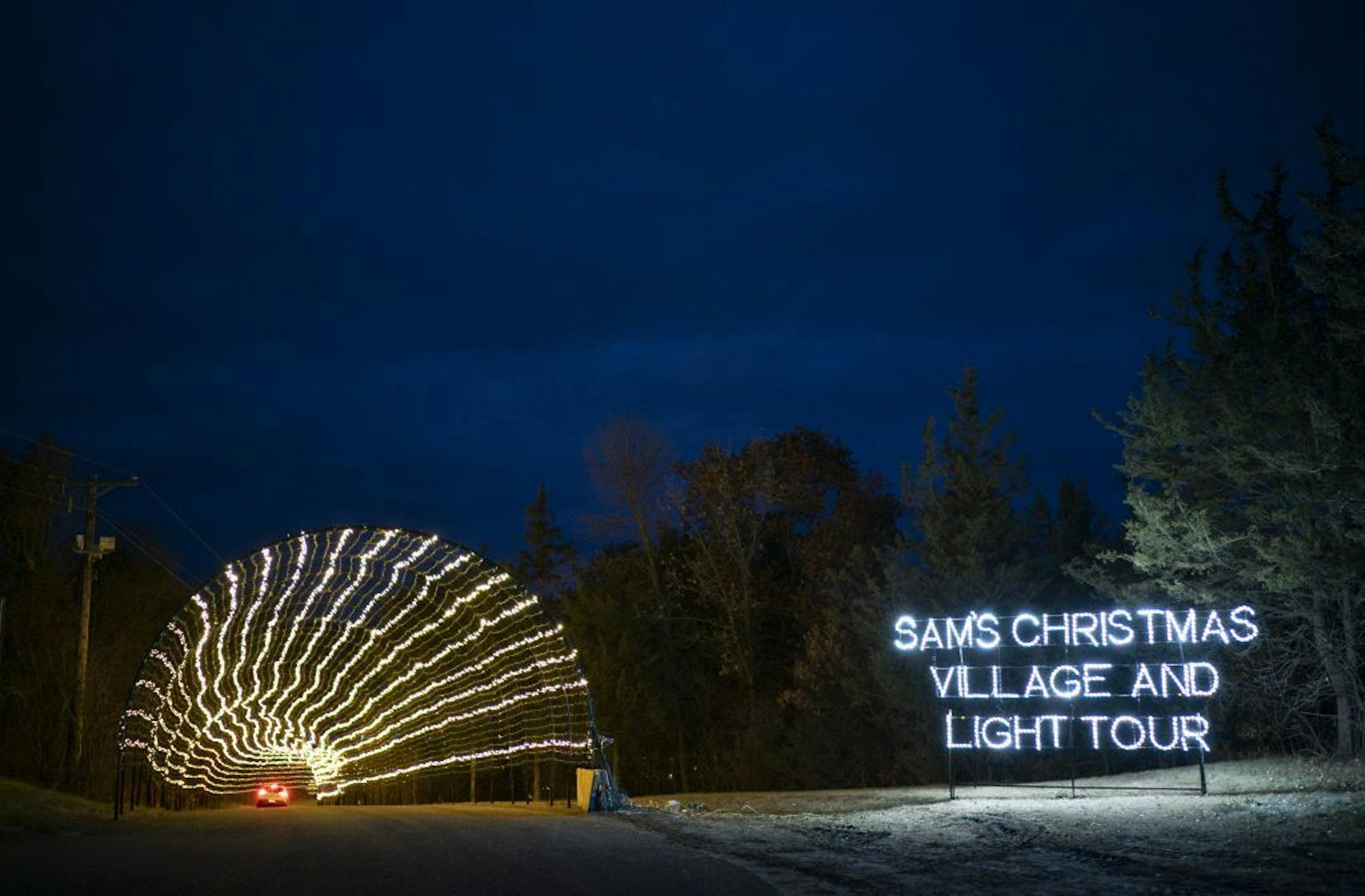 Signage at the main entrance to the attraction. The 540 foot long tunnel at the entrance is lit with 220,000 bulbs.