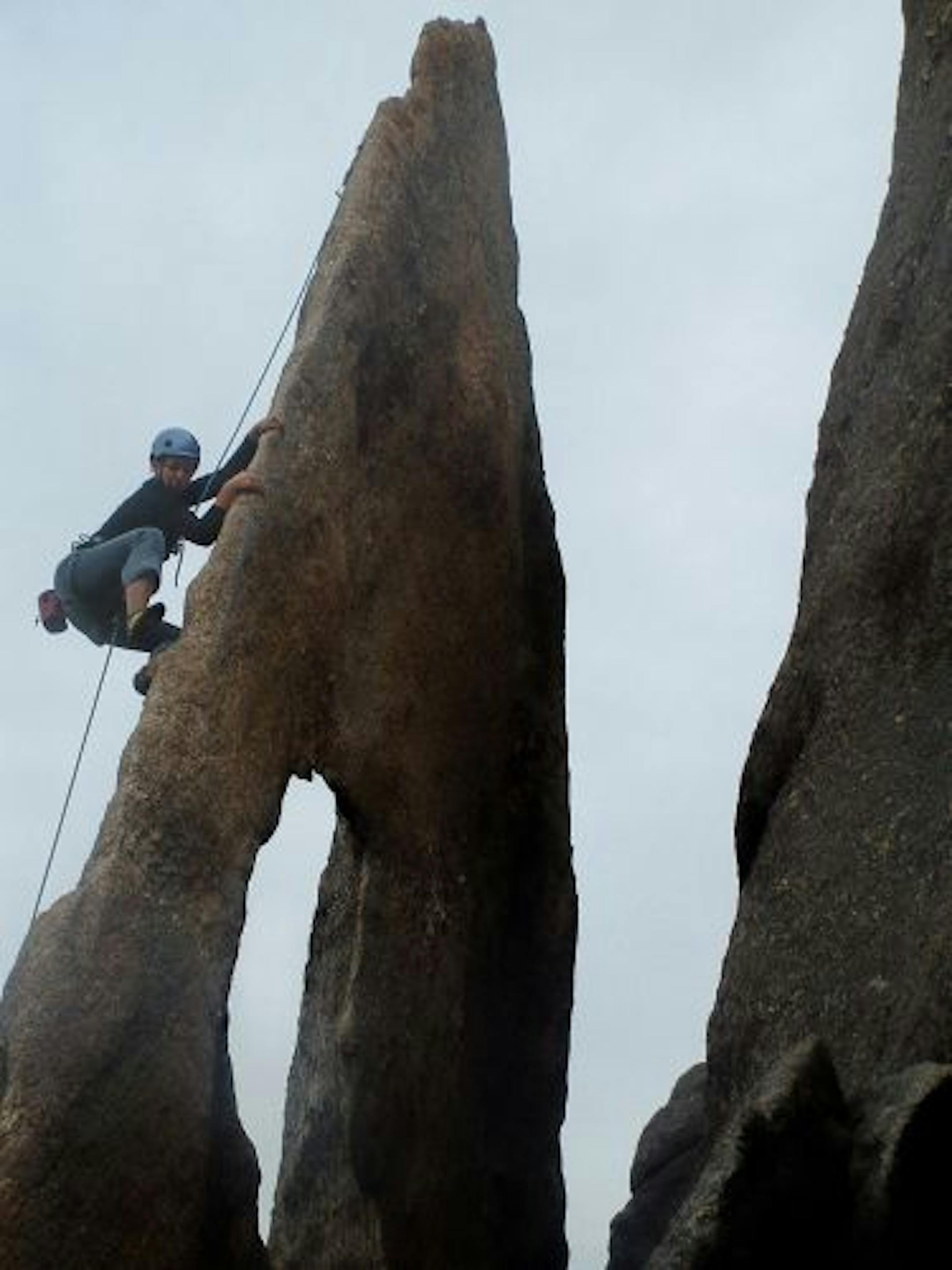 TrekNorth High School student Jamie Owens rock climbing in the Rushmore area of the Needles, S.D.