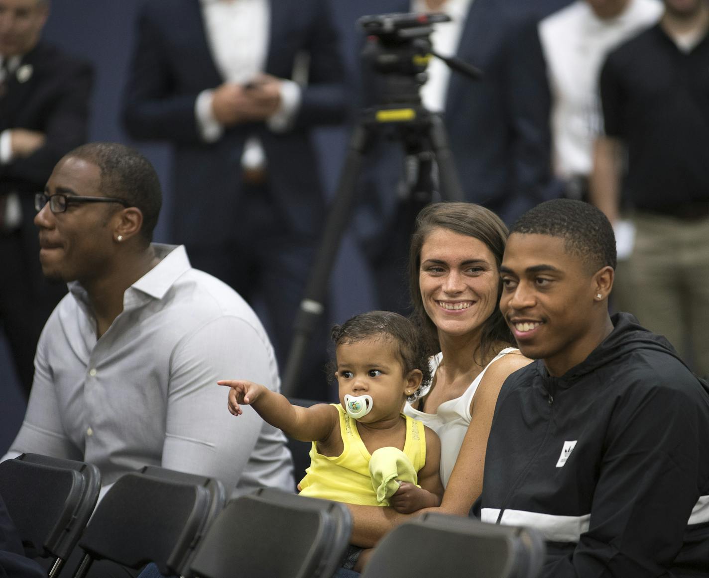 Friends and family of Minnesota Timberwolves first-round draft pick Kris Dunn, including, from left, brother John Dunn, John's significant other, Cassandra Wilcox, their one-and-a-half year old daughter, Aubree Dunn and Kris's close friend, Terrell Hudson. ] (AARON LAVINSKY/STAR TRIBUNE) aaron.lavinsky@startribune.com Minnesota Timberwolves first round draft pick Kris Dunn attended a press conference on Friday, June 24, 2016 in downtown Minneapolis. Dunn, who played point guard in Providence, wa