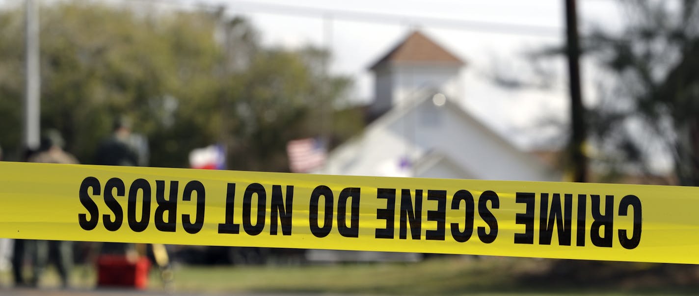 Law enforcement officials continue to investigate the scene of a shooting at the First Baptist Church of Sutherland Springs, Tuesday, Nov. 7, 2017, in Sutherland Springs, Texas. A man opened fire inside the church in the small South Texas community on Sunday, killing and wounding many. (AP Photo/Eric Gay)