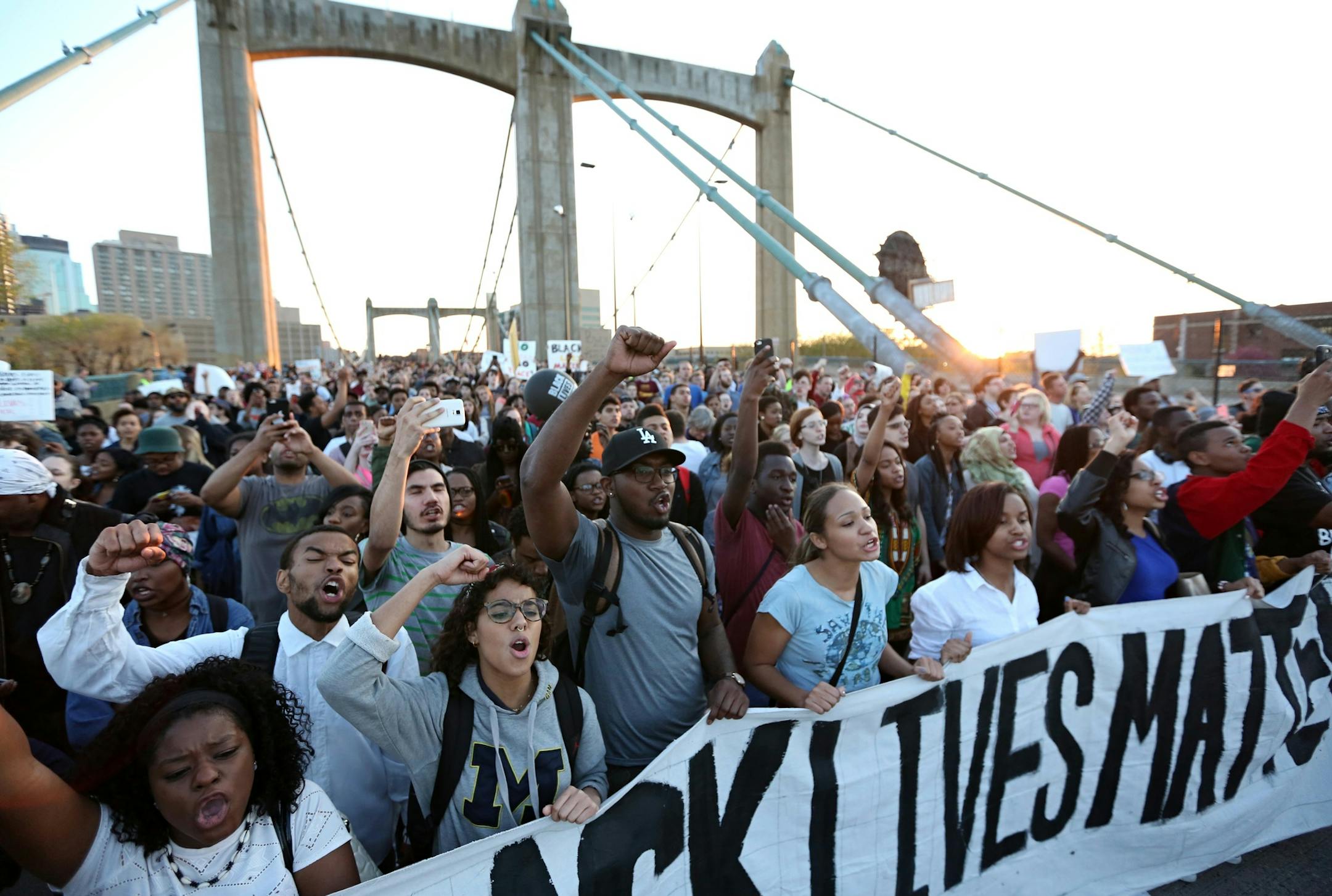 Protesters marched over the Hennepin Avenue bridge during a Black Lives Matter rally that started at Gold Medal Park in Minneapolis, Minn. On Wednesday, April 29, 2015. ] RENEE JONES SCHNEIDER * reneejones@startribune.com