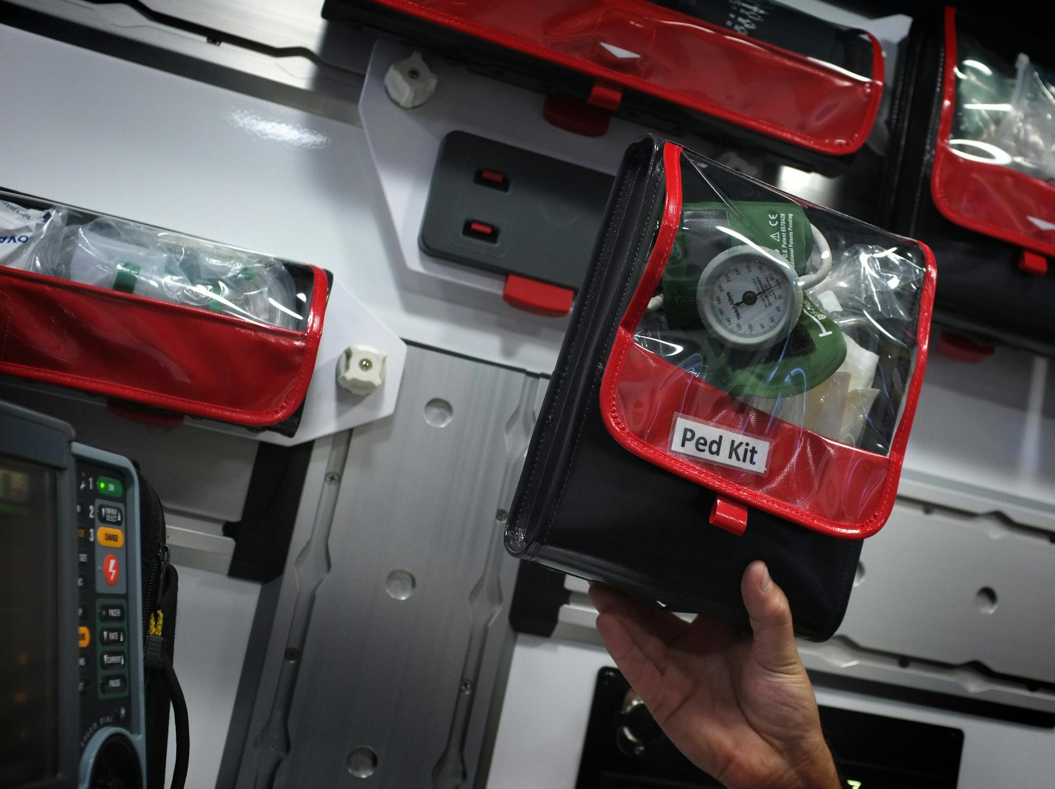 Wall-mounted packs, replacing storage cabinets, keep medical supplies secured but close at hand even at high speeds.