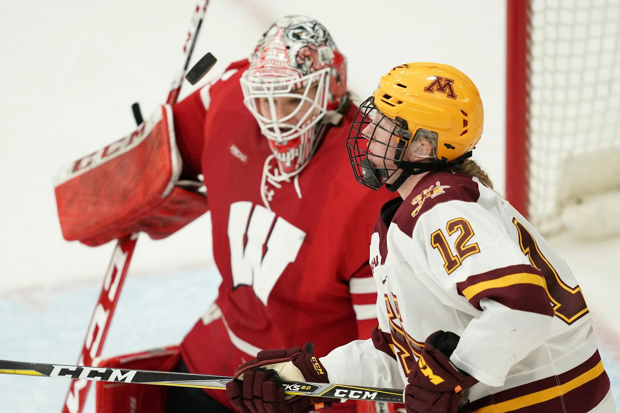 Minnesota Golden Gophers forward Grace Zumwinkle (12) tracked the puck in front of Wisconsin Badgers goaltender Kristen Campbell (35) in the third period. ] ANTHONY SOUFFLE • anthony.souffle@startribune.com The Minnesota Golden Gophers played the Wisconsin Badgers in an NCAA women's hockey game Saturday, Nov. 2, 2019 at the University of Minnesota's Ridder Arena in Minneapolis.