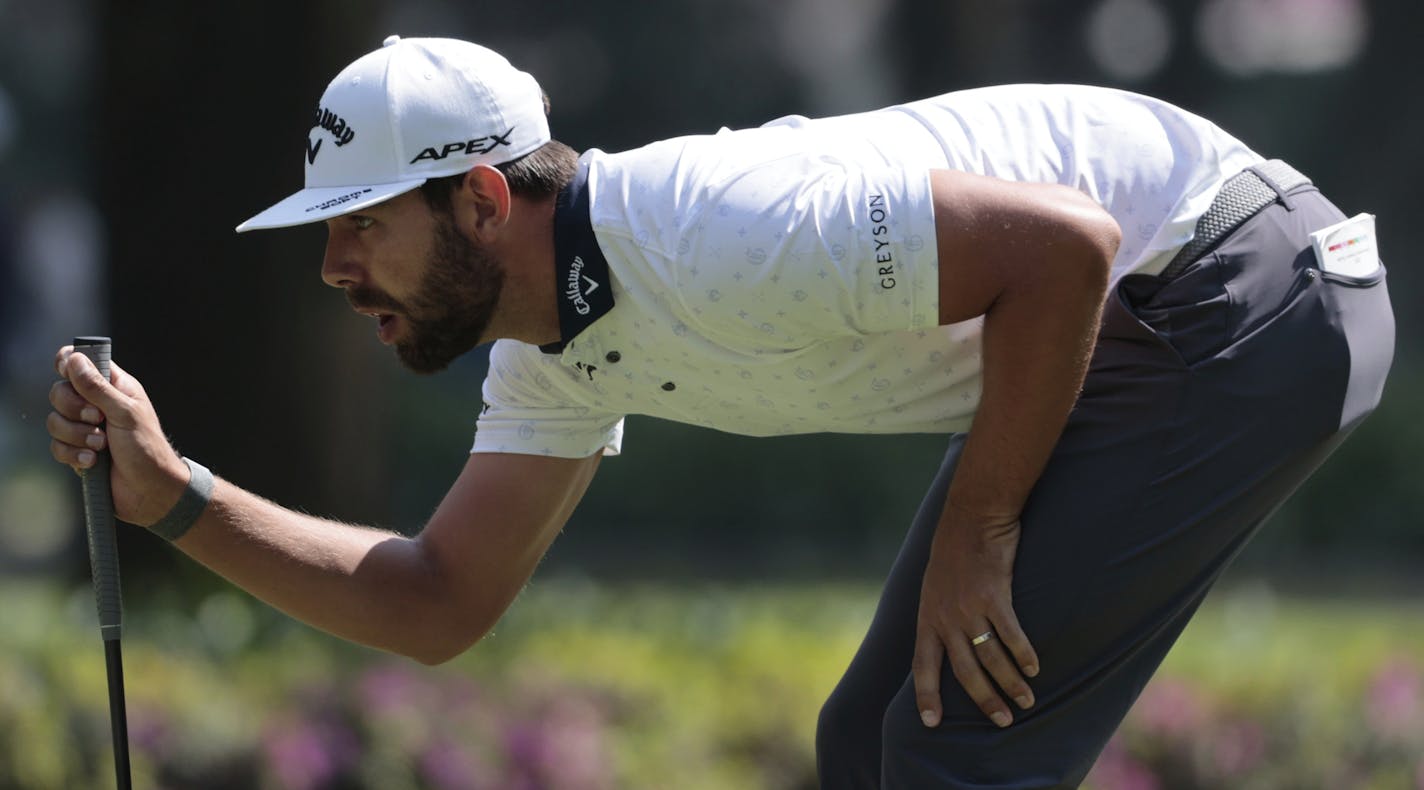 Erik van Rooyen of South Africa studies his putt on the 7th green during the third round for the WGC-Mexico Championship golf tournament, at the Chapultepec Golf Club in Mexico City, Saturday, Feb. 22, 2020.(AP Photo/Fernando Llano) ORG XMIT: XFLL148