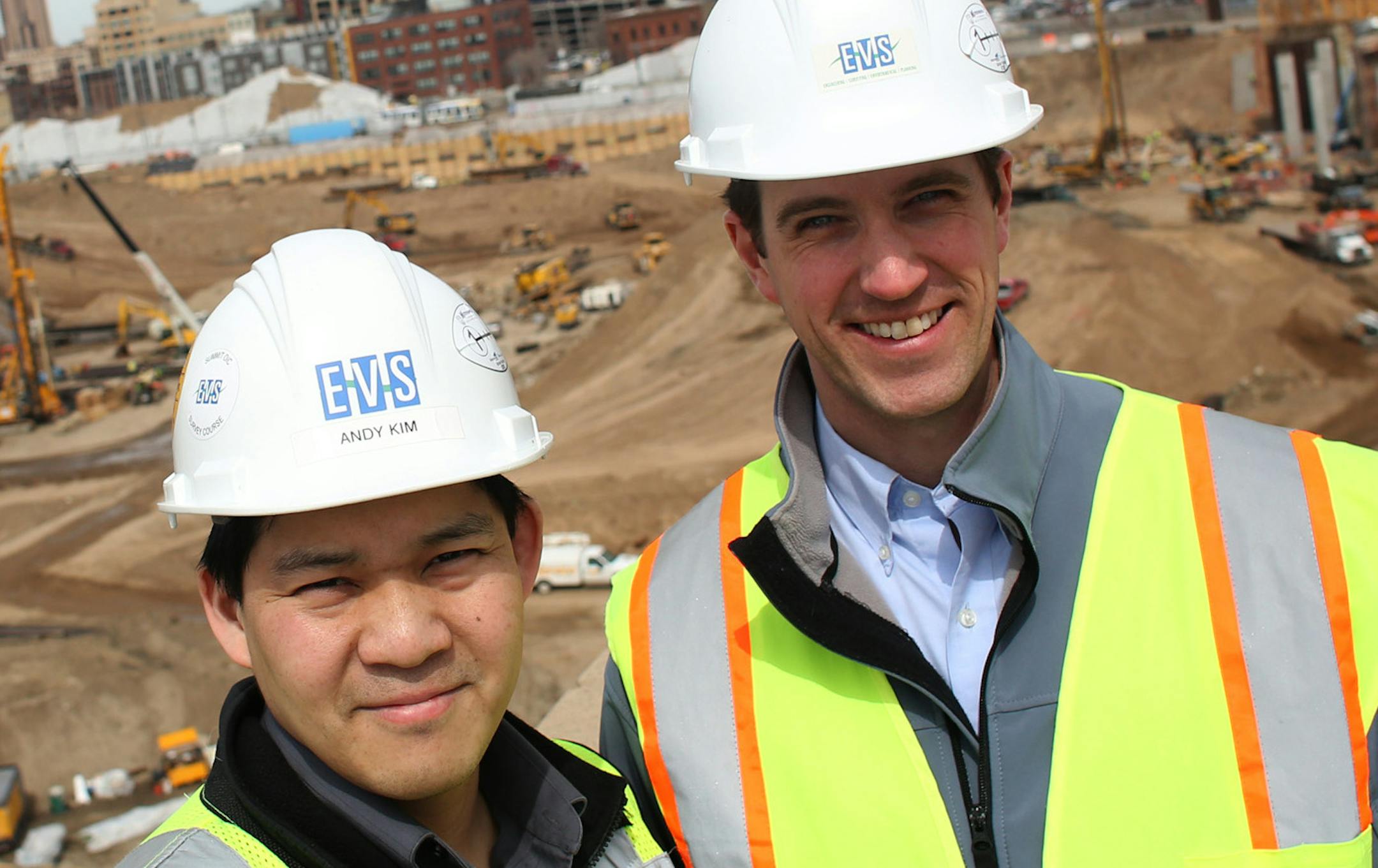 Andy Kim and Dan Bowar of EVS stood above the Metrodome construction site. ] (KYNDELL HARKNESS/STAR TRIBUNE) kyndell.harkness@startribune.com Andy Kim, one of the main minority contractors for the stadium, and his biz partner, Dan Bauer in Minneapolis, Min, Wednesday, April 2, 2014.