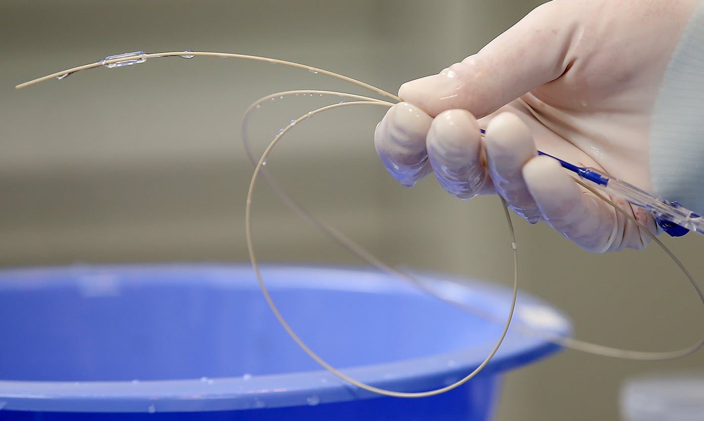 Fouad Bachour, MD, and his team implanted a CardioMem, (the device at the end of the wire) a new St. Jude product, into patient Joe Jones at Hennepin County Medical Center, Thursday, February 26, 2015 in Minneapolis, MN. ] (ELIZABETH FLORES/STAR TRIBUNE) ELIZABETH FLORES &#x2022; eflores@startribune.com