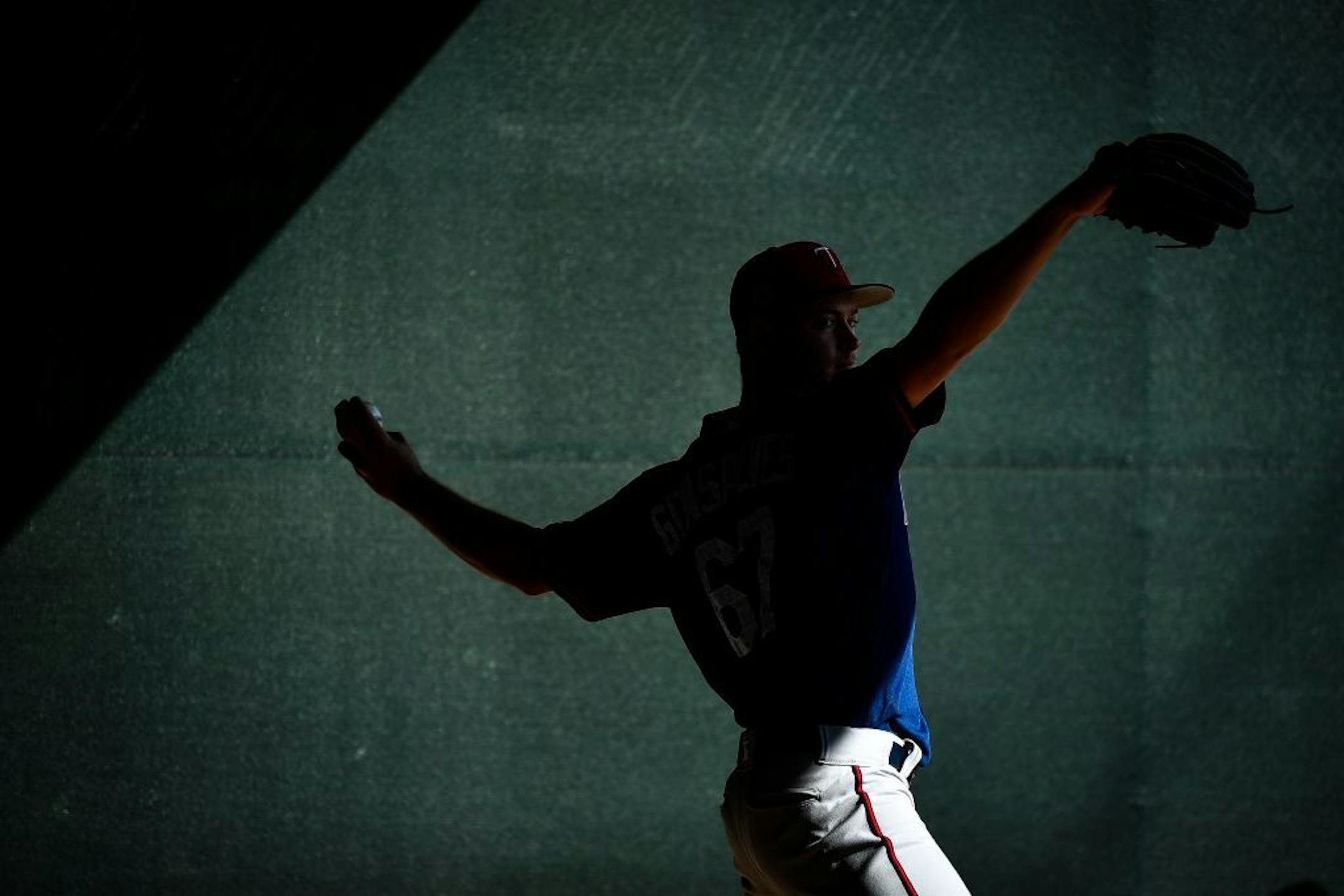 Minnesota Twins pitcher Stephen Gonsalves (67) practiced his throw in the bullpen Friday morning.