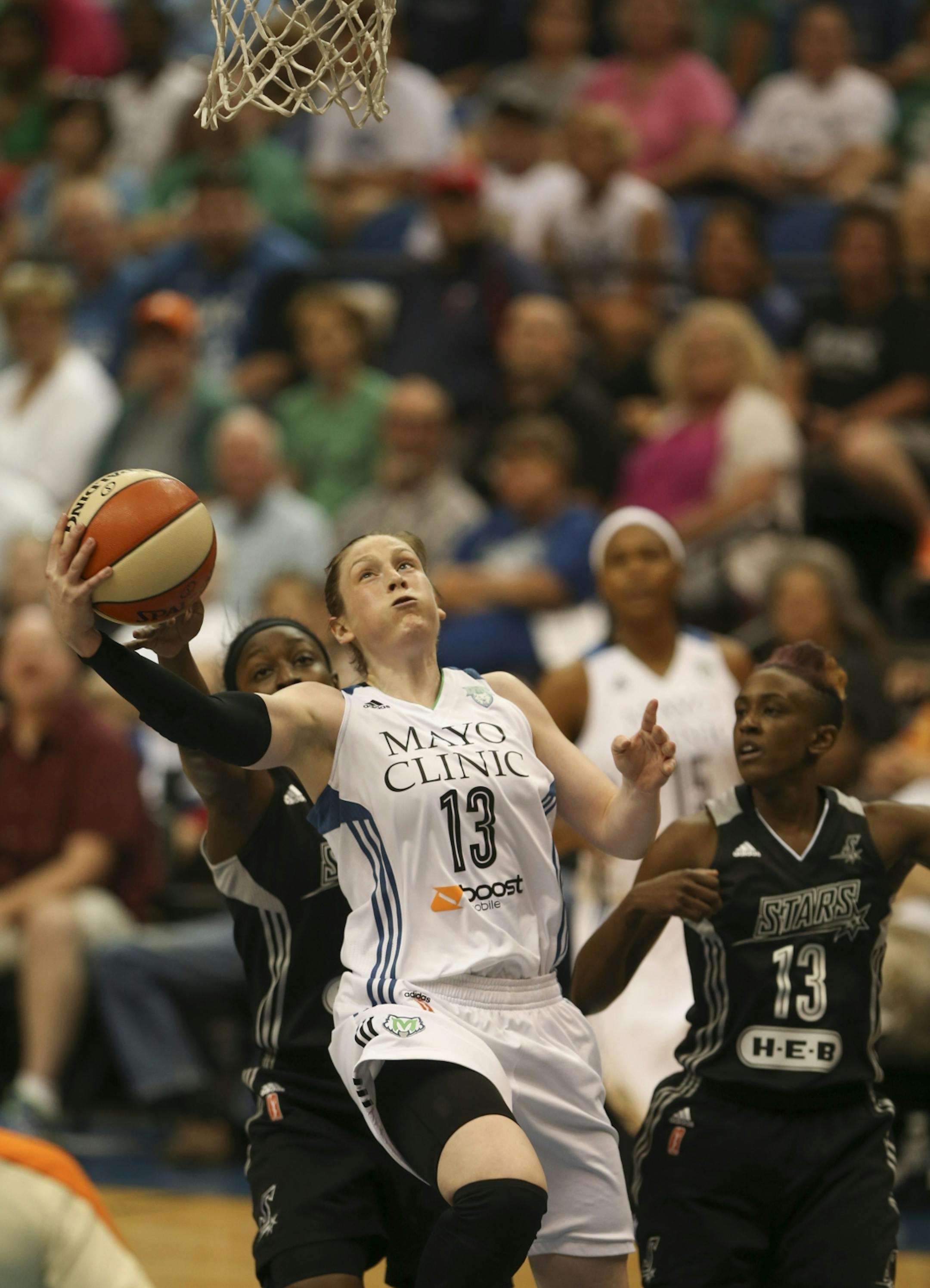 The Lynx' Lindsay Whalen drove to the hoop in the first quarter Sunday night at Target Center. JEFF WHEELER � jeff.wheeler@startribune.com The Minnesota Lynx met the San Antonio Stars in an WNBA game Sunday night, July 12, 2015 at Target Center in Minneapolis.
