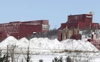 FILE - In this Feb. 10, 2016, file photo, the closed LTV Steel taconite plant is abandoned near Hoyt Lakes, Minn. The Army Corps of Engineers has awar