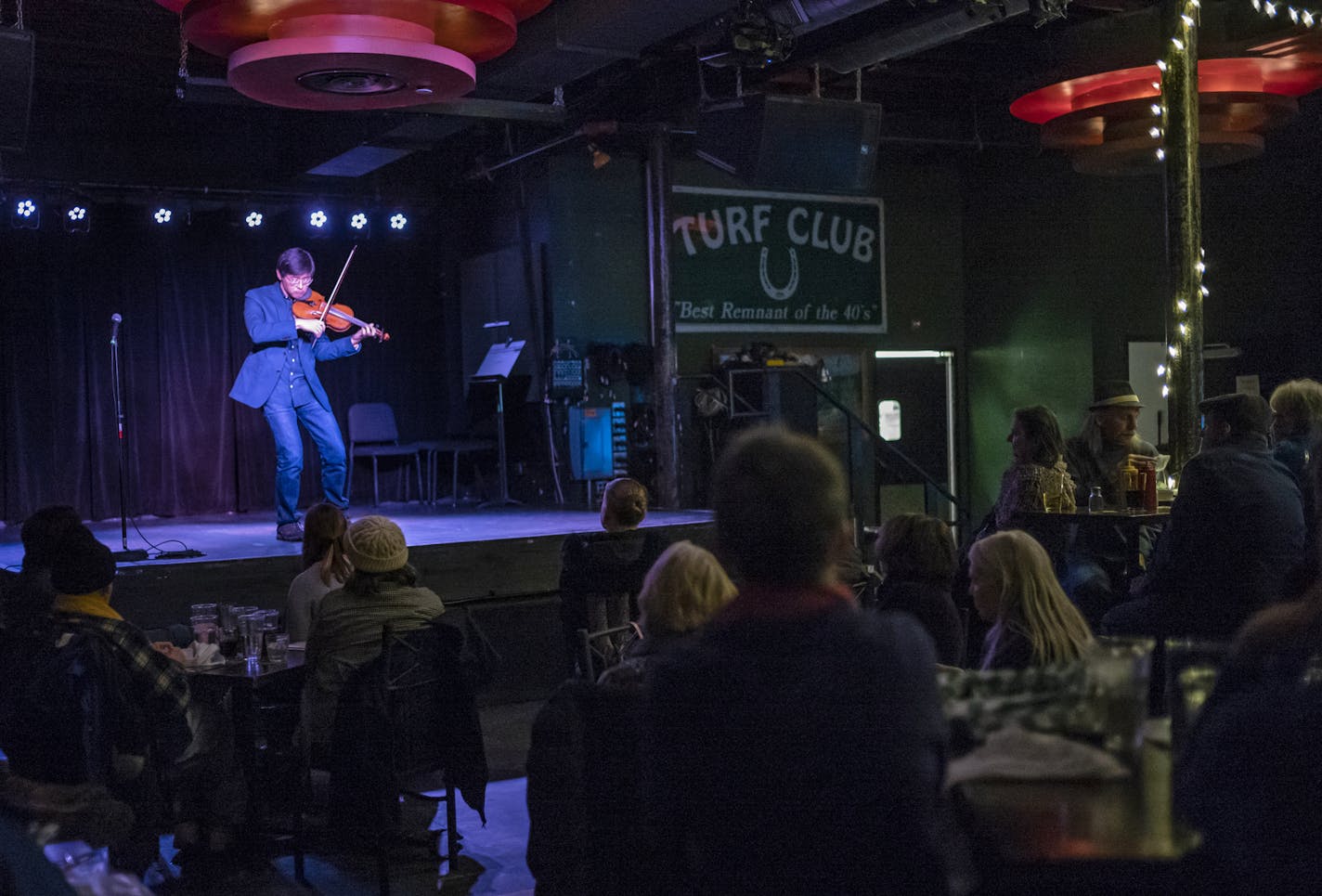 Kyu-Young Kim opened the evening on the violin.] Members of the SPCO will play music and tell stories around the idea of "home" at the Turf Club, a rock bar in St. Paul that's actually become a home-away-from-home for the SPCO as it tries to reach new audiences. RICHARD TSONG-TAATARII &#xa5; richard.tsong-taatarii@startribune.com