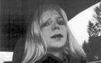 FILE - This undated file photo provided by the U.S. Army shows Pfc. Chelsea Manning wearing a wig and lipstick. Harvard University reversed its decisi